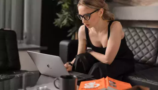 make asynchronous online courses more engaging for this young woman looking intently at her laptop